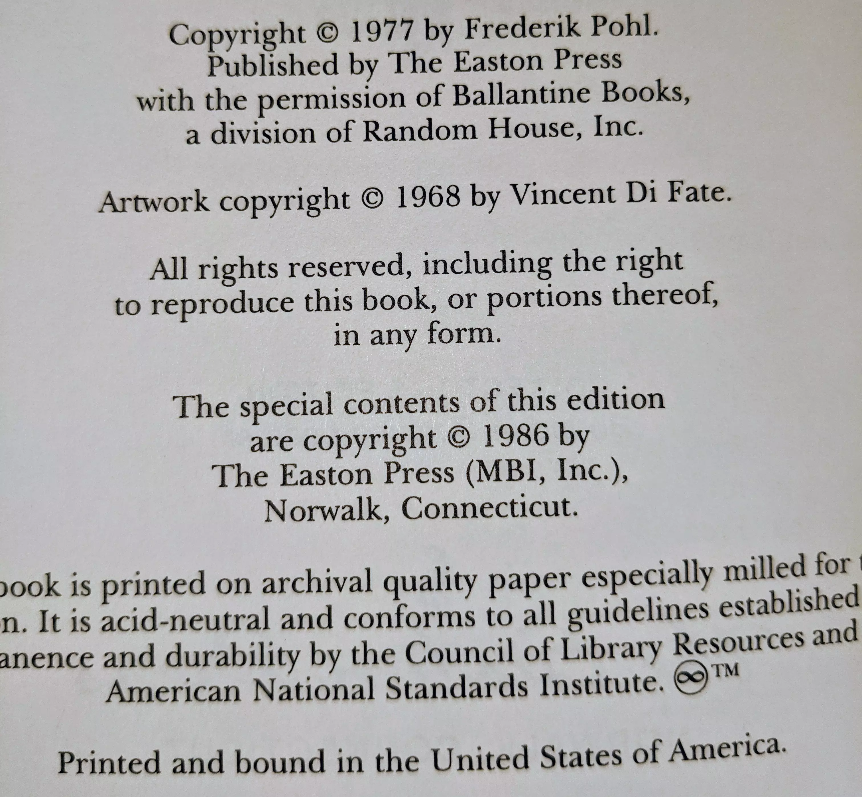 Stunning Dark Navy Blue Leather Bound hardback book with hubbed spine, cover artwork in 22kt gold, printed on archival paper with gold gilded edges, smyth sewing & concealed muslin joints
	  - original artwork by Vincent DiFate